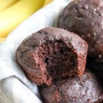 double chocolate banana muffins in a basket