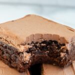 chocolate liqueur brownie bitten into