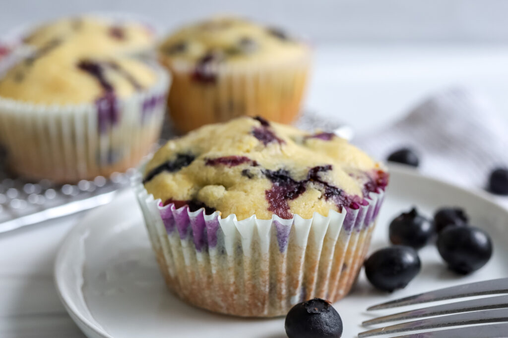blueberry cornbread muffin on a plate