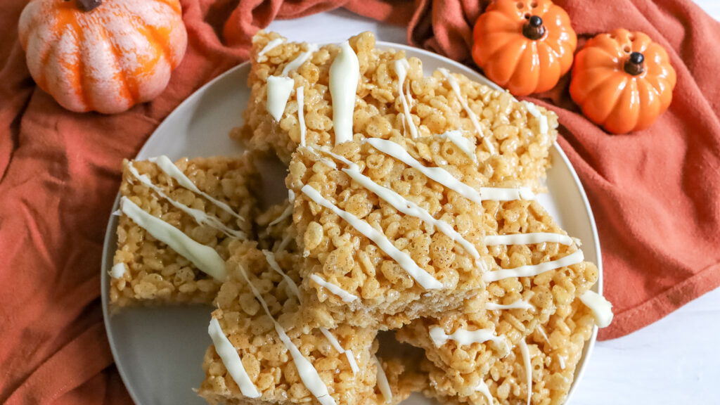 pumpkin rice krispie treats on a plate