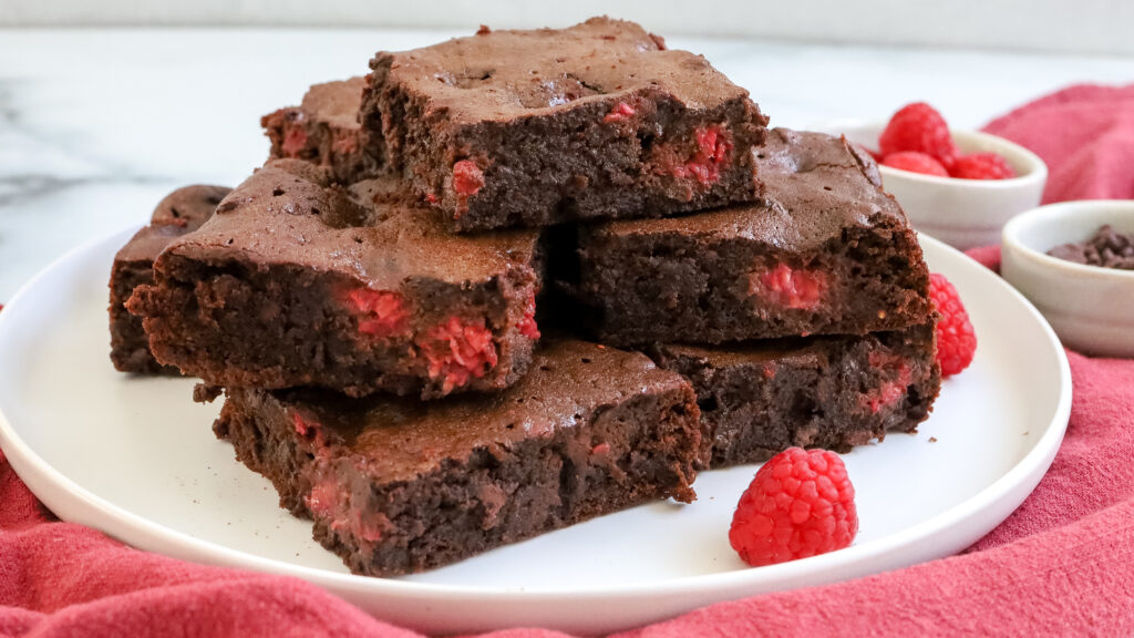 raspberry brownies on a plate