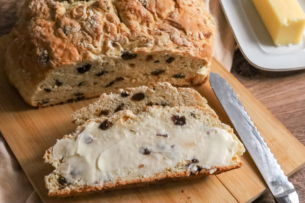 Sliced Irish Soda Bread with butter on it