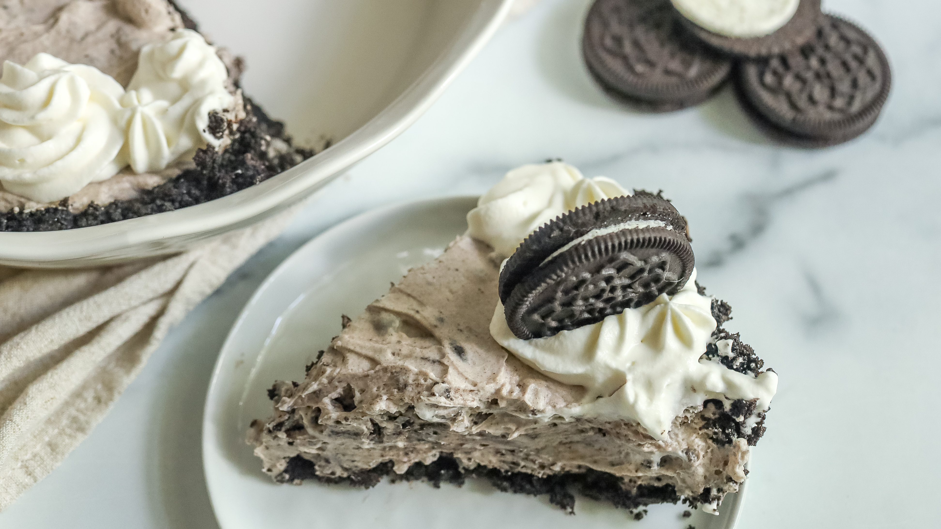 a slice of no-bake oreo pie