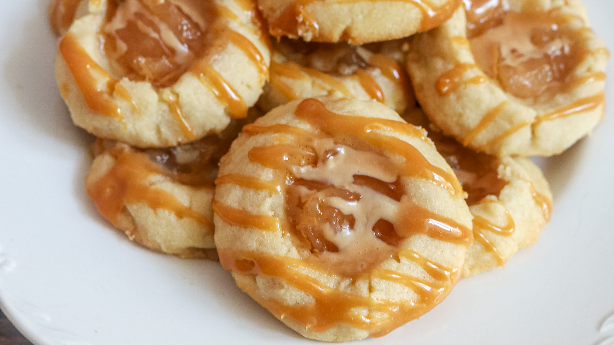 close up of caramel apple pie thumbprint cookies