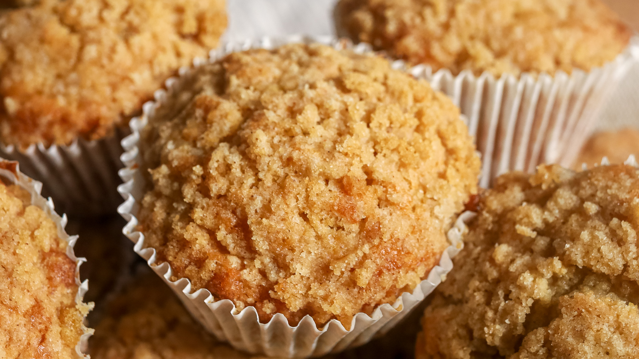 close up of an apple crumble muffin