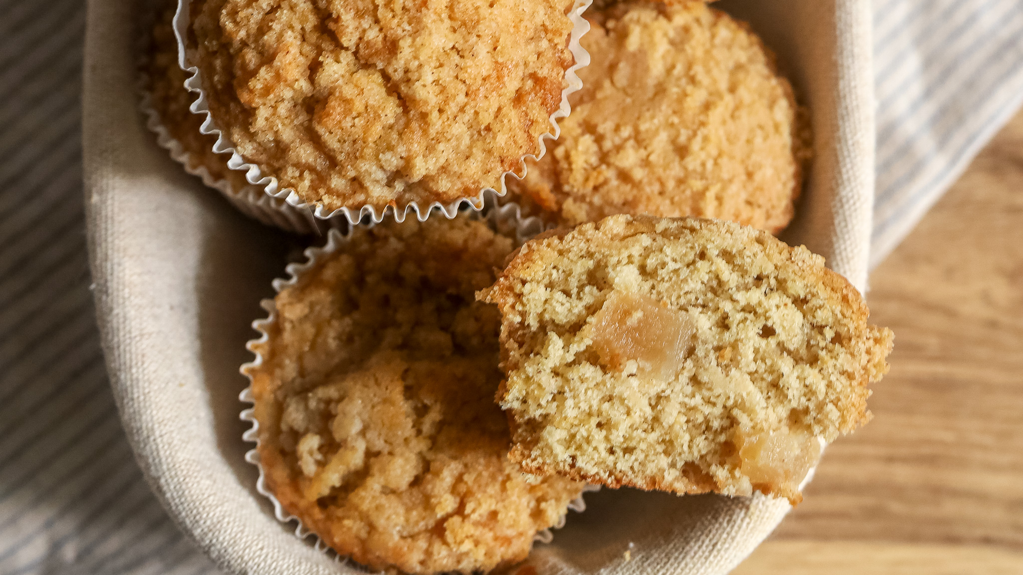 a basket of apple pie muffins