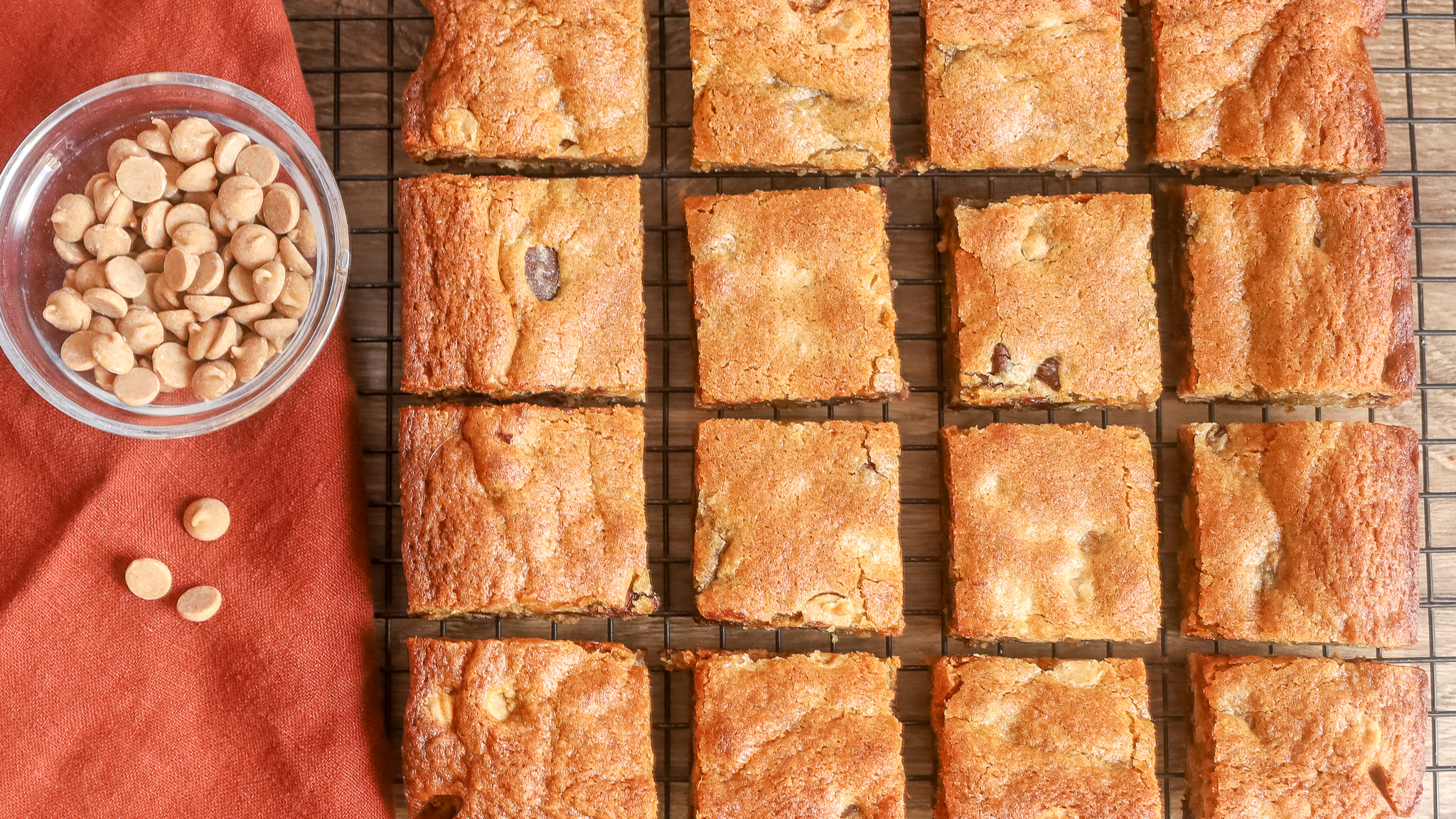 overhead shot of peanut butter blondies on a cooling rack