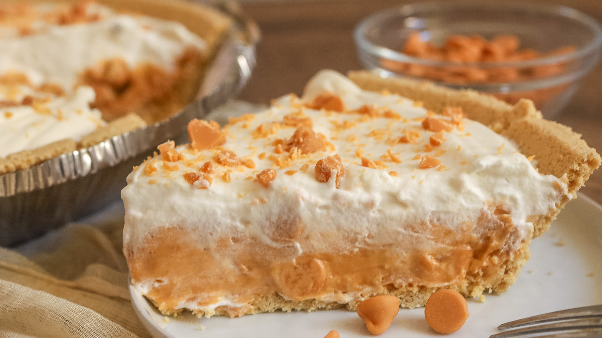 Close up image on the side of a slice of bourbon butterscotch pie