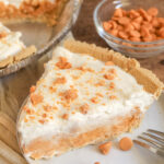 A slice of bourbon butterscotch pie on a plate