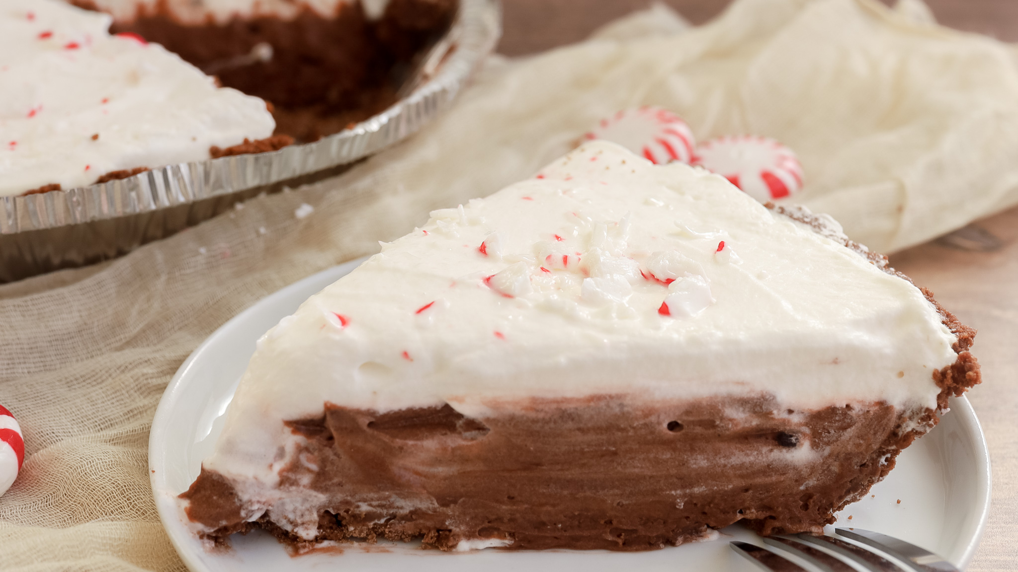 close up of a slice of chocolate peppermint pie