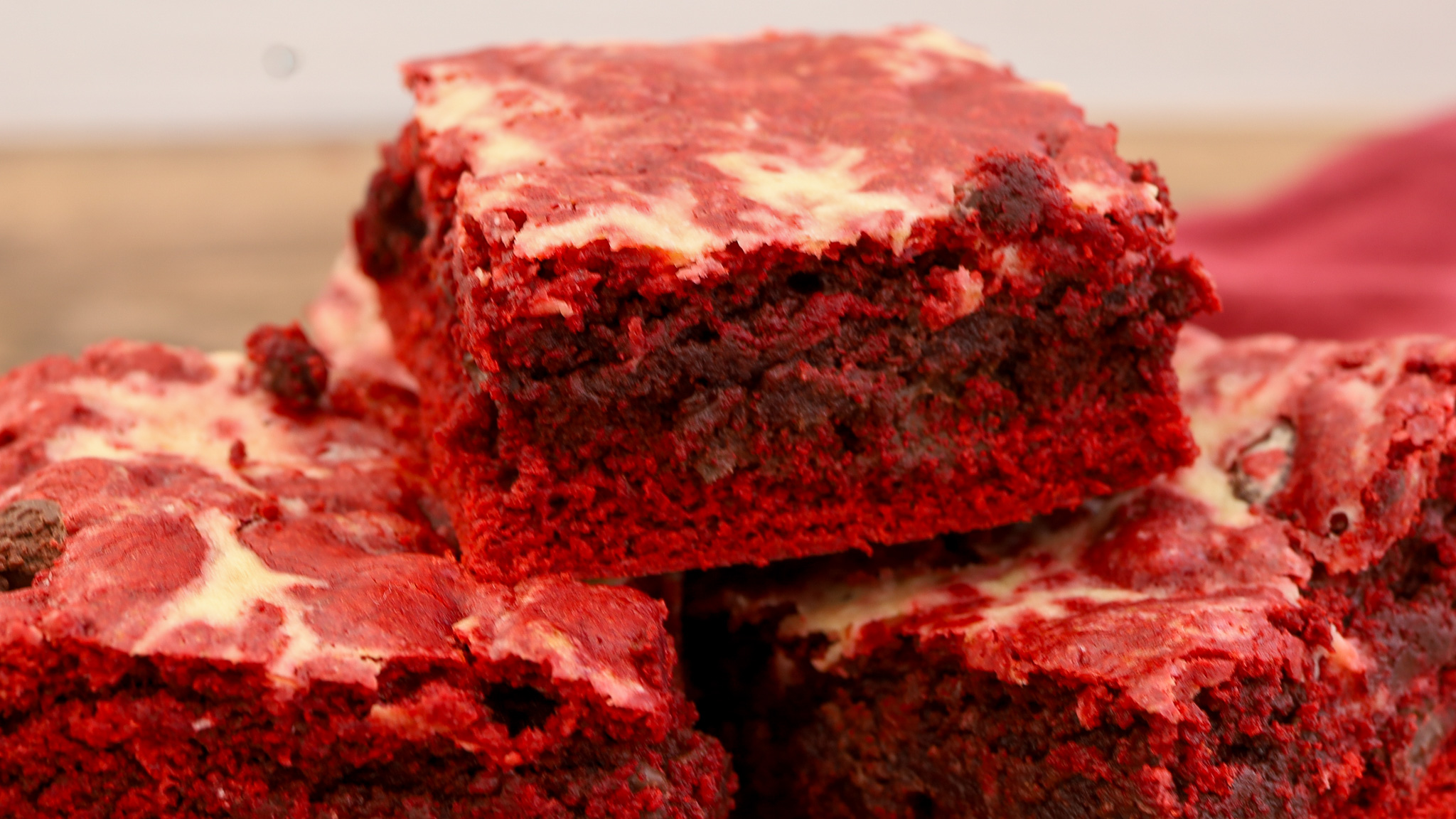 close up of red velvet cheesecake brownies