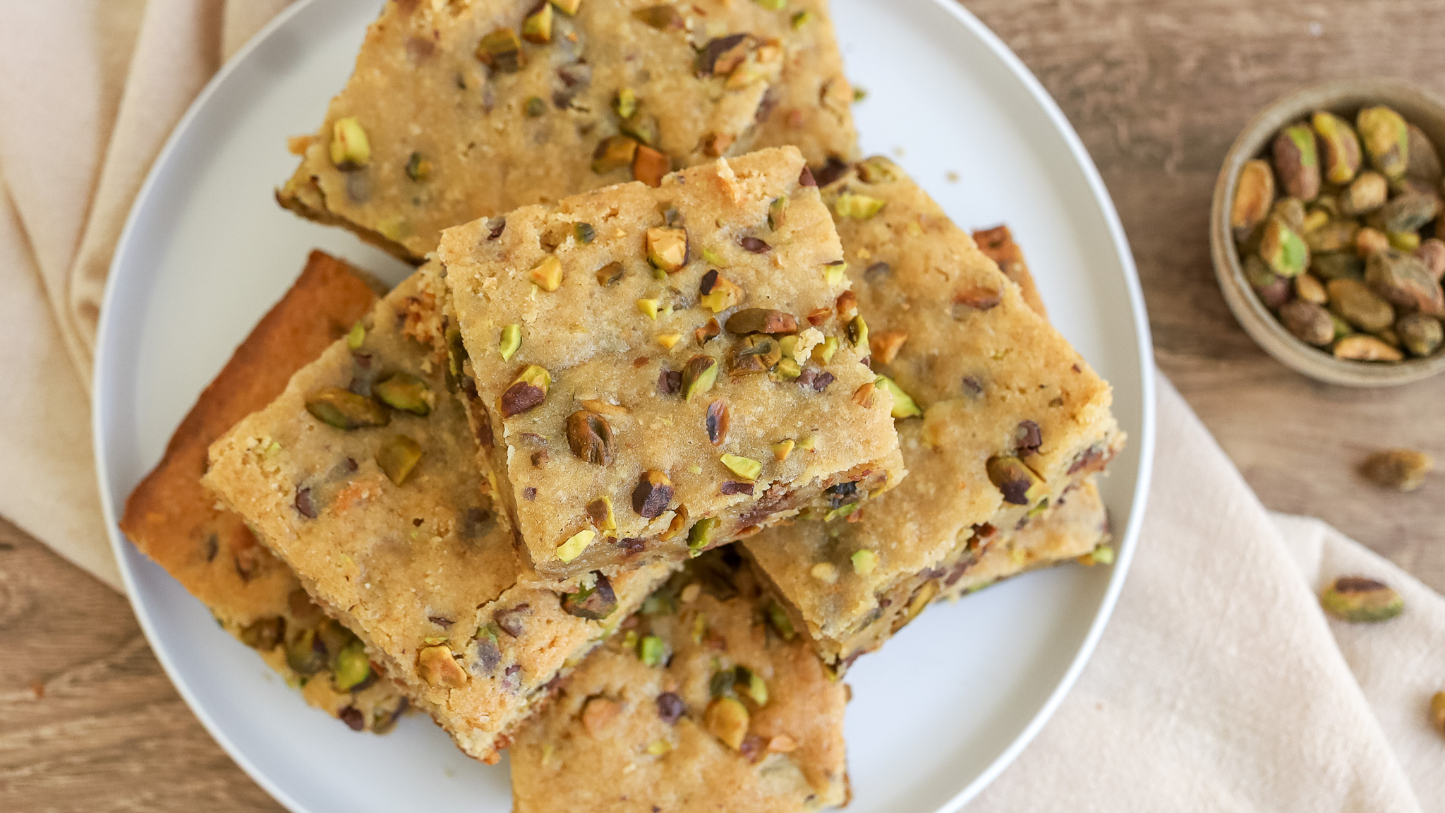 close up overhead photo of chocolate chip and pistachio blondies