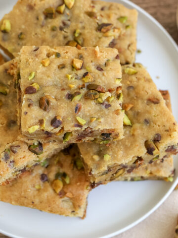 pistachio blondies on a plate