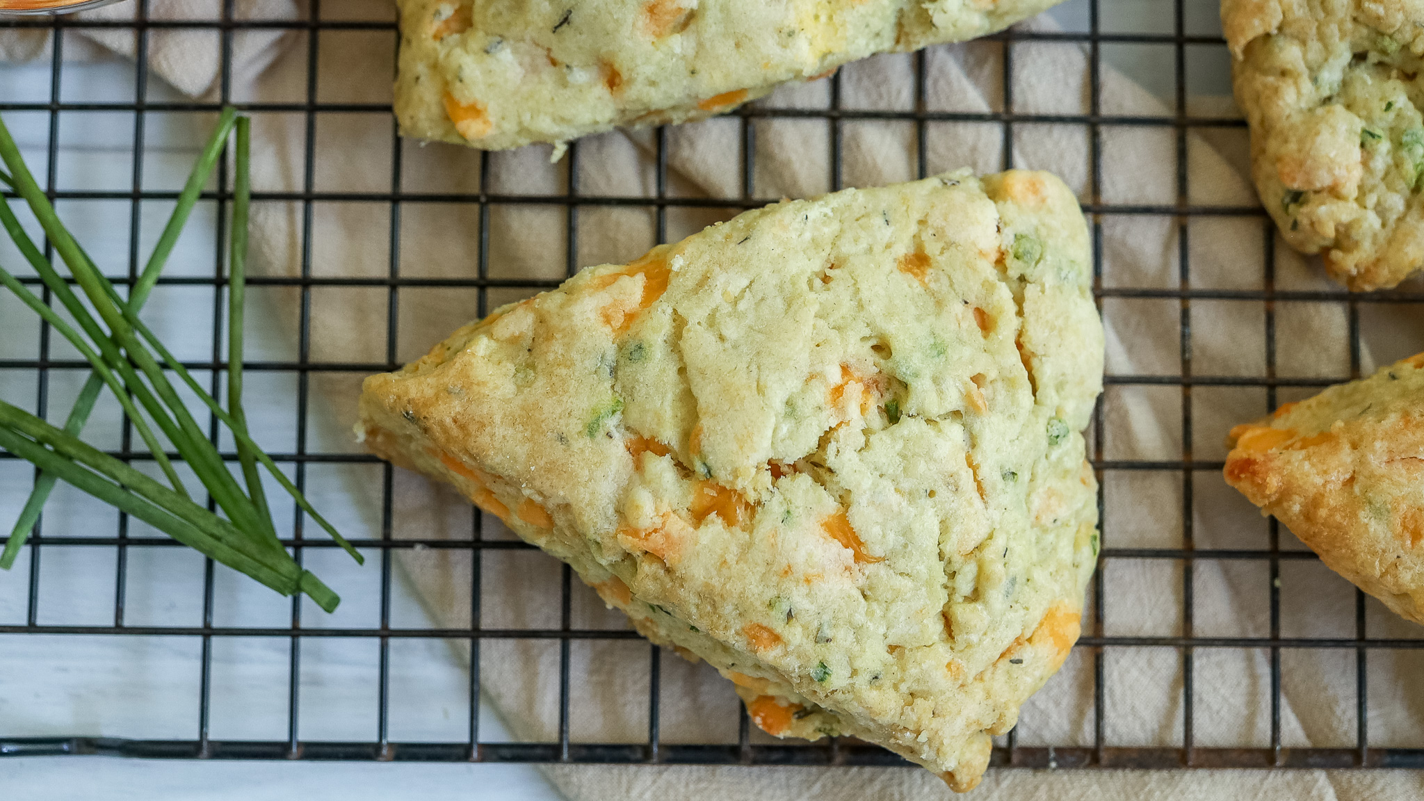 close up overhead shot of cheddar herb scones
