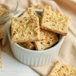 Everything bagel crackers in a bowl